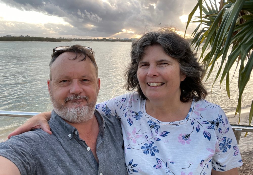 Melissa and Ben together at the water's edge on the Sunshine Coast